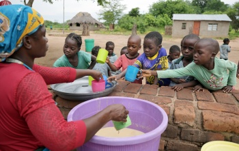 Children receiving meals in Zambia