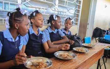 Girls with food in class