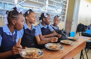 Girls with food in class
