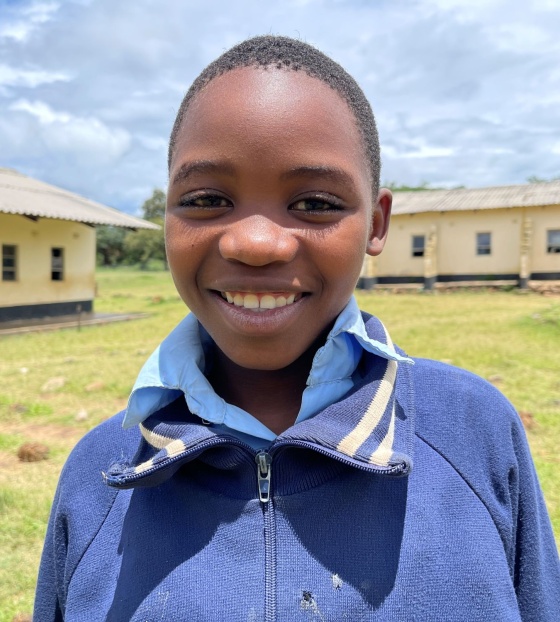 Gugulethu in front of her school