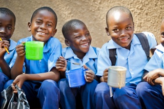 Children eating Mary's Meals