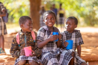 Children eating Mary's Meals
