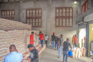 Our partners in Haiti handling and managing food for school meals. 