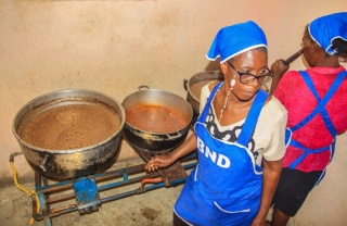 Volunteers cooking