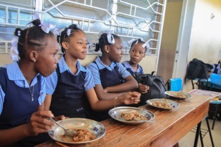 Girls with food in class
