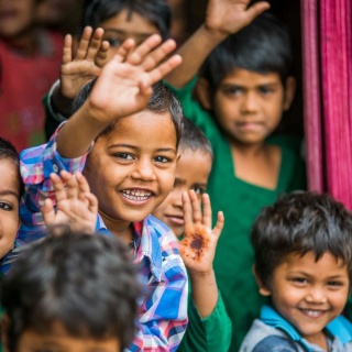 Boy waving