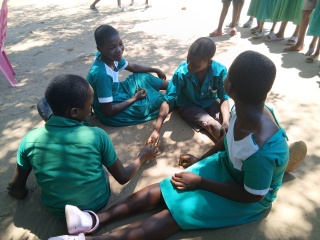Tawina playing with her friends