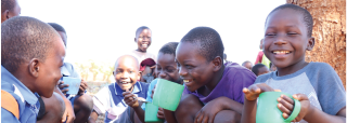 Boys eating and laughing